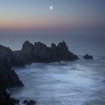 Crescent moon over Pedn Vounder, Cornwall