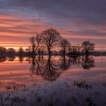 A fiery Winter sky over a flooded Somerset Levels